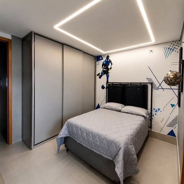 Dormitório jovem com armário e painel